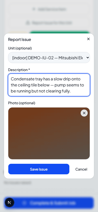 Report Issue dialog filled in with a description and a photo attached